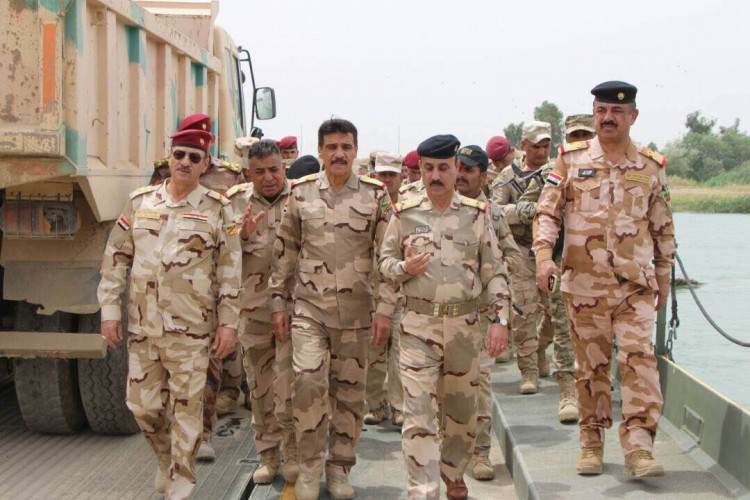 القوات الأمنية تحرر دائرة صحة نينوى والجسر الخامس بالموصل