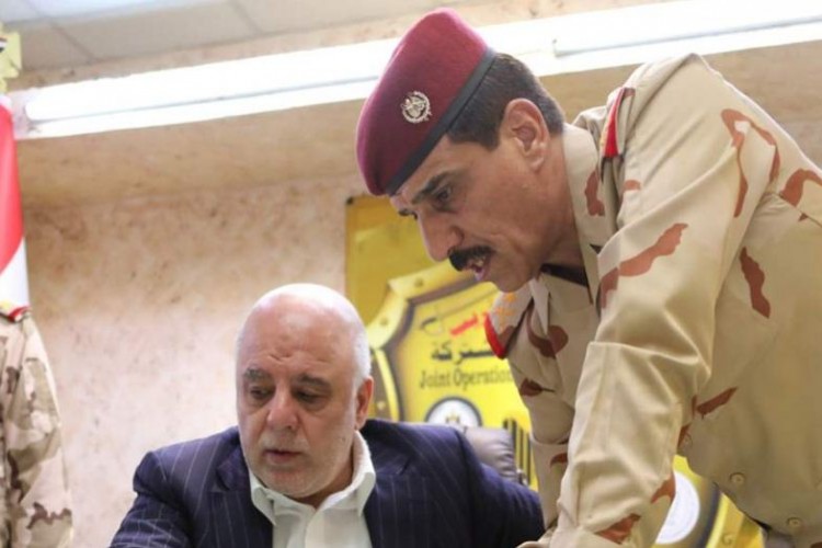 العبادي يطلع على عمل قيادة عمليات تأمين الحدود العراقية